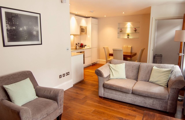 Modern apartment with sofa bed, patio and private entrance
