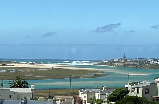 Modern apartment with sea, river & garden view in charming Still Bay. No smoking