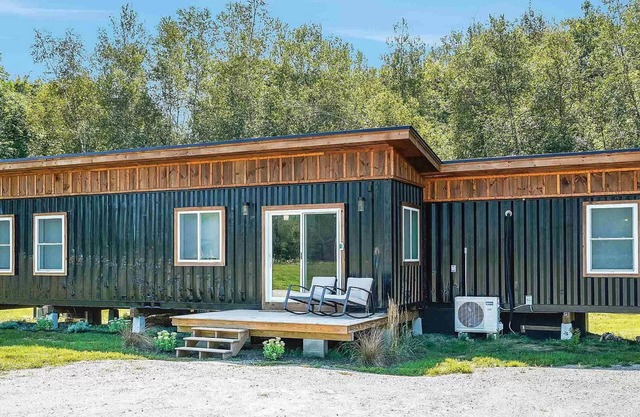 Modern Container House with mountains, river, and privacy.