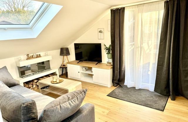 Modern holiday apartment with balcony and garden