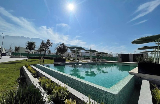 Modern home with pool, garden & 24 7 security