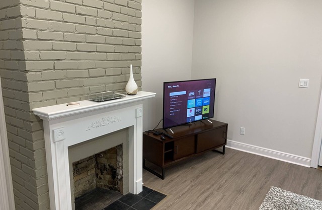 Modern lower level midtown apartment with cable and high speed internet!