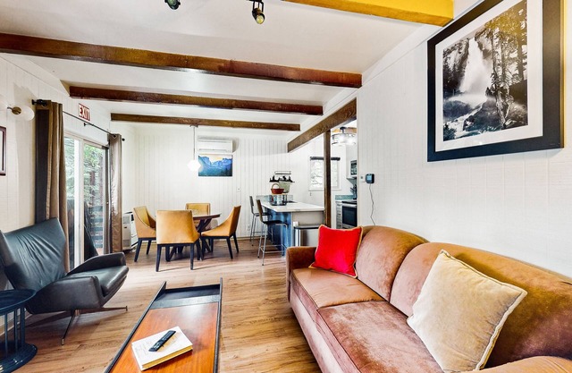 Modern lower unit duplex cabin with fireplace, balcony, & EV charger