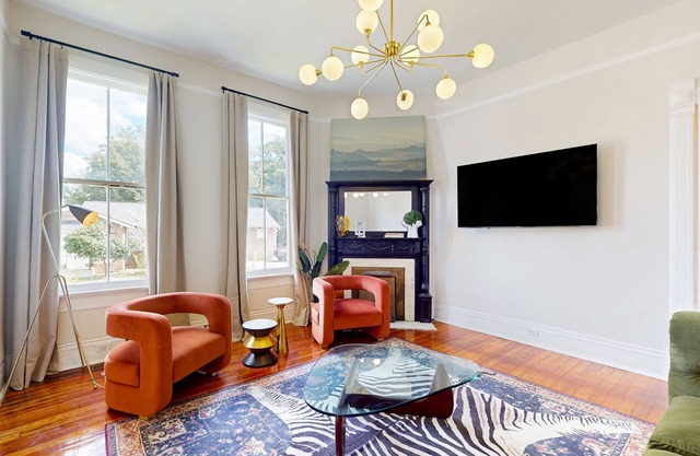 Modern & luxe home in a great location with wood fireplace & original finishes