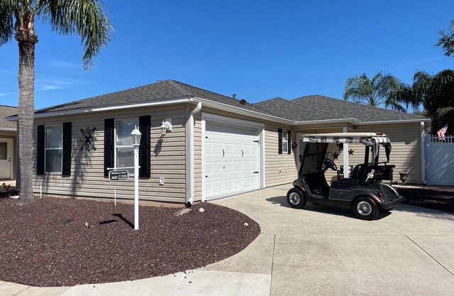 Modern Open-Plan Home w/Updated Kitchen, Private Lanai & Golf Cart