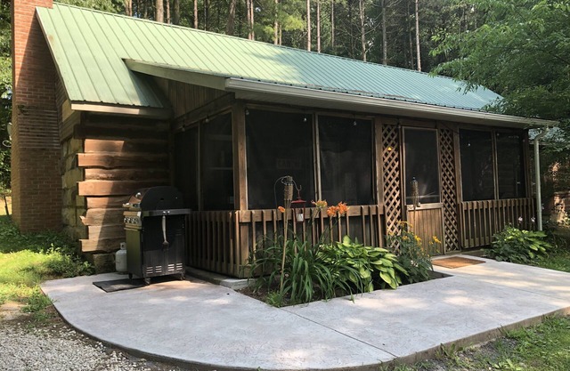 n Rustic Cabin Retreat on 120 Acres with Private Lake, Wildlife, and Fireplace.