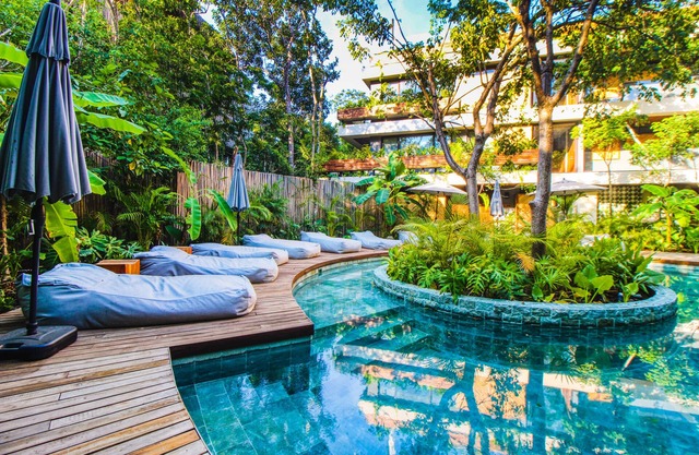 Nature-inspired studio with balcony, kitchenette, & pools - near beach