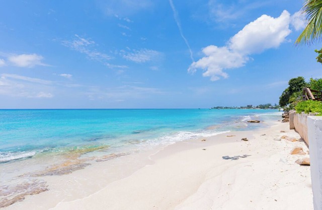 Nautilus One – A Beachfront Condo on Seven Mile Beach - by Cayman Villas