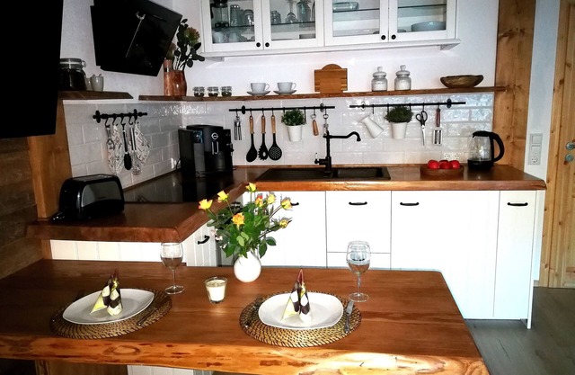 New! exclusive cozy apartment with tiled stove