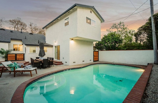 *New* modern pool home + 5 mi to beach + sleeps 14