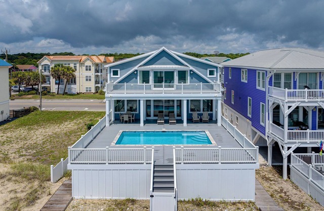 NEW! Ocean Front luxurious 6 bedroom home Pool, Elevator, and on the Beach!
