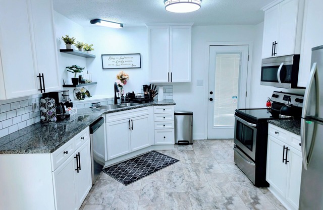 New Spacious 4-bedroom Home & Big Fenced Yard