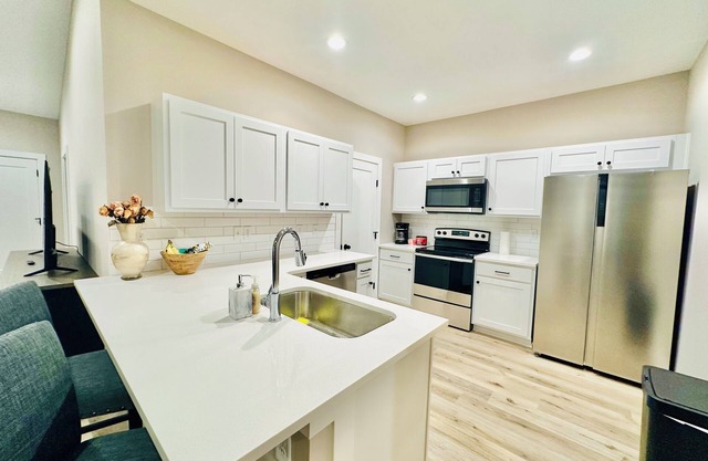 New Spacious 4BR Home! Basketball Court & Playground.