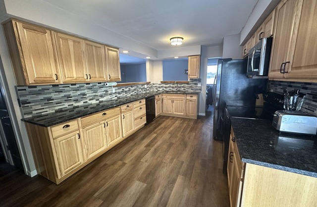 NEW Three bedroom ranch style pet friendly home with a patio & theatre room!