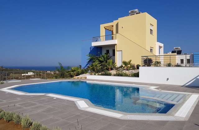 New villa with private pool and wonderful sea views