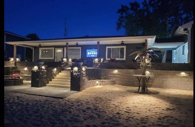 Newly remodeled Beachfront home on privately owned lake .