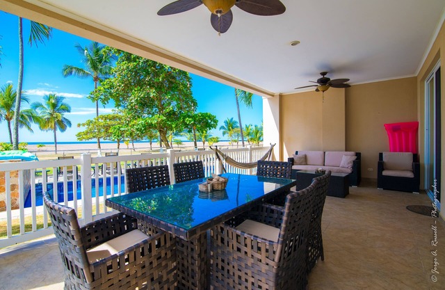 Ocean front and just steps from the pools and ocean!