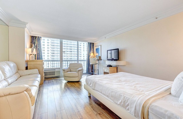 Ocean-view resort room with fitness center, beach access, AC, & high-speed WiFi