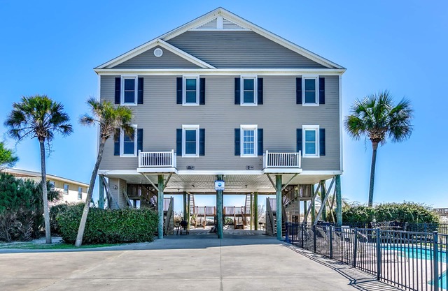 Oceanfront duplex with 6 bedrooms/6 bath on each side. This is Drs Orders