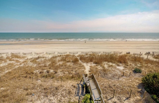 Oceanfront ocean view condo with private W/D & central AC - walk to everything