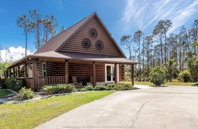 One of a kind, real log home in southwest Florida!