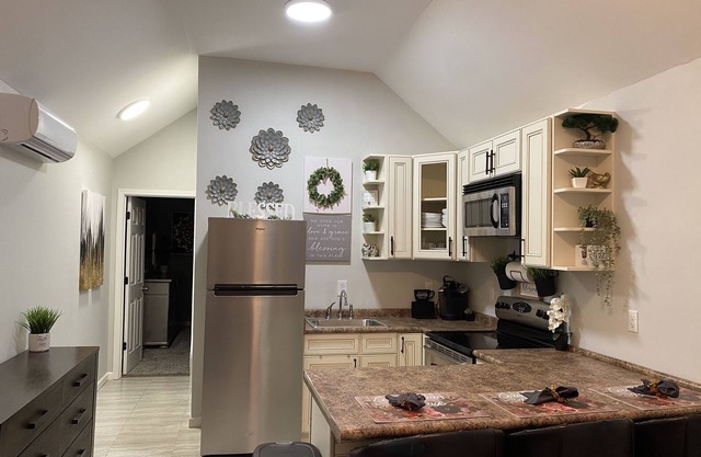 one-of-a-kind tiny but spacious with king-size bed