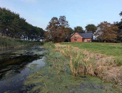 Op Lundingland - Bootshaus am alten Priel