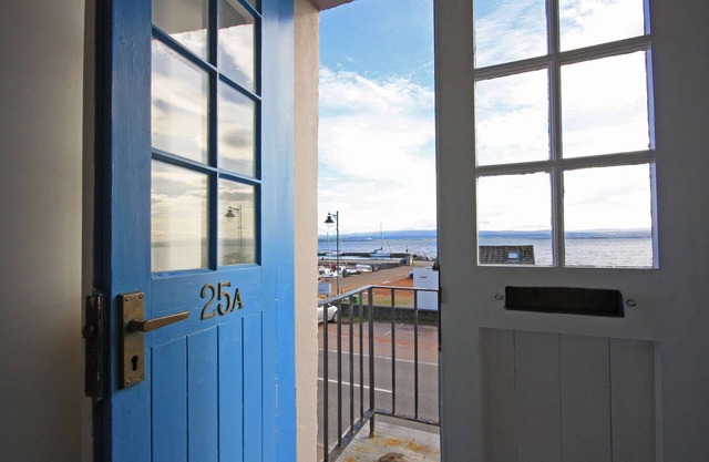 Overlooking Avoch harbour and the Moray Firth. Spot dolphins from the kitchen.
