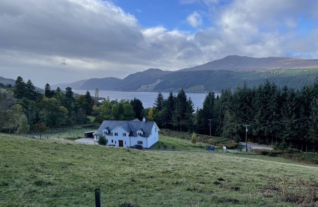 Overlooking Loch Ness, a luxury holiday home accommodating 12 adults