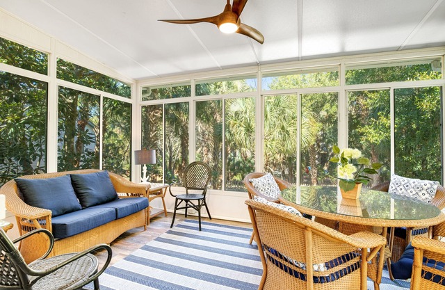 Palmetto-lined home with porches, yard & hammock - walk to beach/town