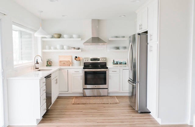 Peaceful Lakefront Home with spacious Deck and Lawn Leading Down to Lake