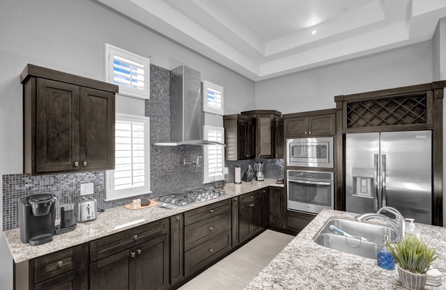 Peaceful luxurious corner home in front of a park. Has a yard for dogs