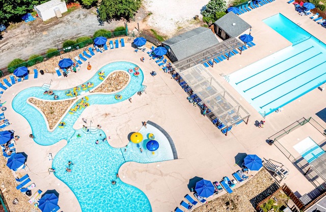 Peaceful oasis with alfresco living, resort amenities, & seasonal mountain view