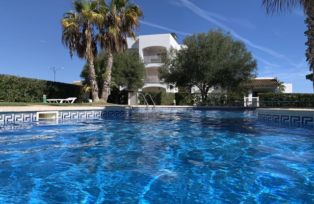 PENTHOUSE WITH ROOF TERRACE - MODERNIZED - palm garden - pool - sea view