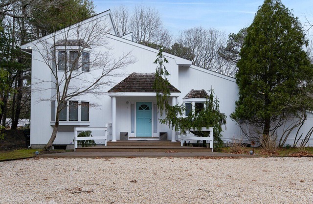 Post-Modern-style home with coastal-style bedrooms, an open-floor plan, a...