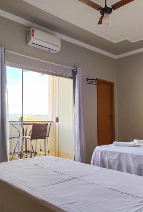 Pouso Oliveira Suítes