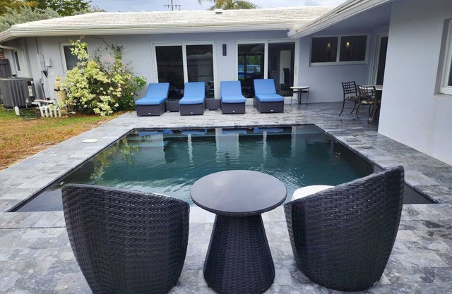 Pristine and Modern Bayview Bungalow With Heated Pool!