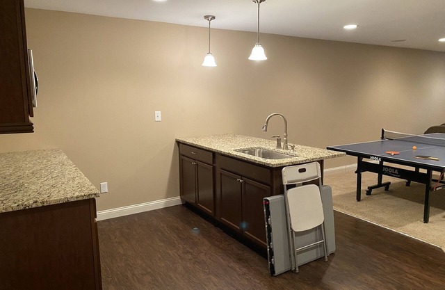 Private basement bedroom with full bathroom and wet bar