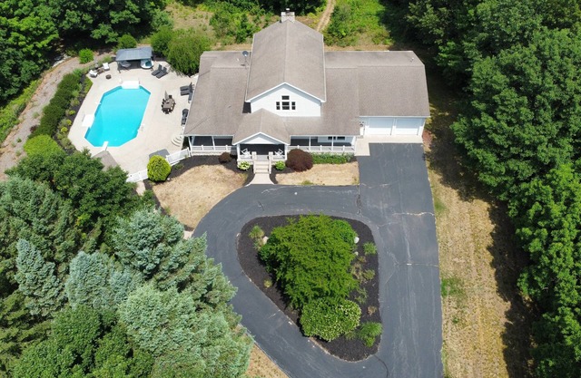 Private heated pool, ATV trails and shooting range on 20 acres
