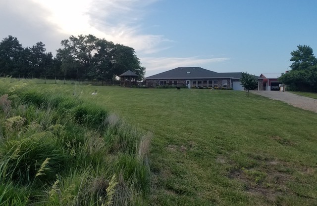 Private loft on charming acreage between Omaha and Lincoln w/animal sanctuary.