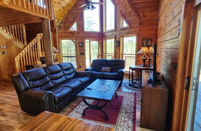 Private log cabin with lake/river/beach access.