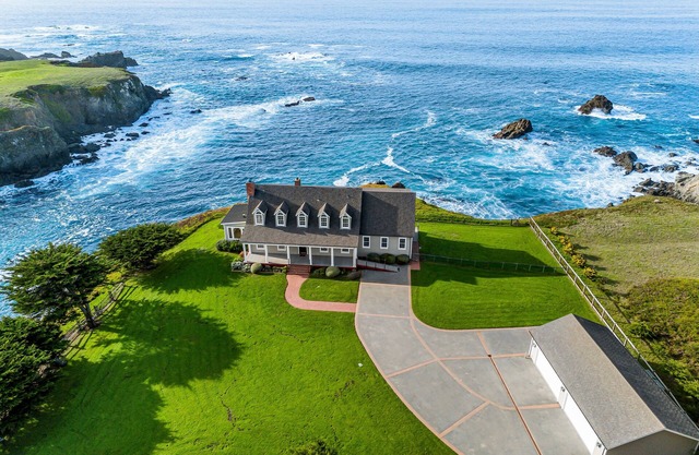 Private, oceanfront, blufftop sanctuary on 8 acres with stunning sunset views