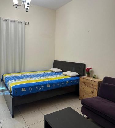 Private room with balcony fully furnished in Dubai Silicon Oasis