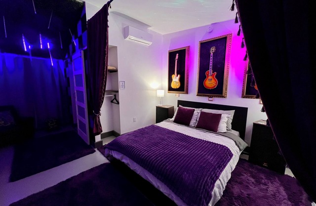 Purple Rain Hotel Room with Pool and Hot Tub