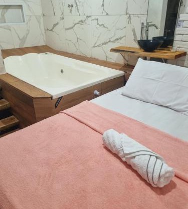 Quarto casal banheira