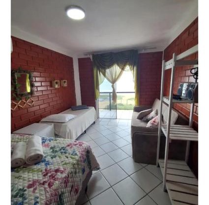 Quarto frente mar com sacada!