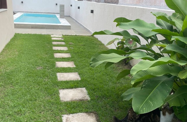 Quarto na praia com cama de casal