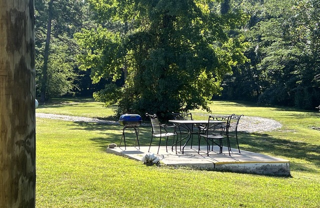 Queen Guest Room located at the Joplin Inn at the entrance to Mountain Harbor, just 2 1/2 miles from Lake Ouachita. by RedAwning