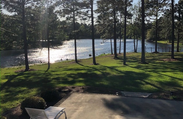 Quiet lake front property in peaceful neighborhood setting.