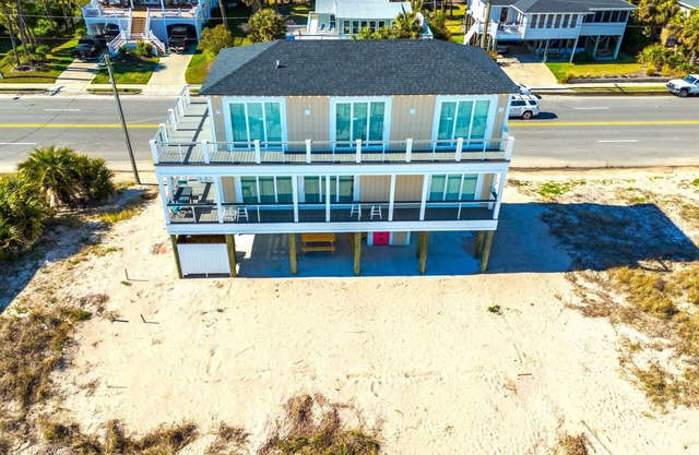 RECENTLY BUILT 4 Bedroom, 4 1/2 bath home with Luggage Lift, Oceanfront